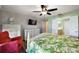 Spacious bedroom with king-size bed and en-suite bathroom at 14315 Se 85Th Ave, Summerfield, FL 34491