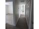 Bright hallway with light walls and vinyl flooring at 2792 Sw 161St Loop, Ocala, FL 34473