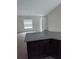 Kitchen island with granite countertops and dark brown cabinets at 2792 Sw 161St Loop, Ocala, FL 34473