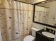 Bathroom with shower/tub combo, vanity, and updated fixtures at 3333 Se 12Th St, Ocala, FL 34471