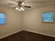 Bright bedroom featuring hardwood floors and ceiling fan at 3333 Se 12Th St, Ocala, FL 34471