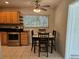 Kitchen with breakfast nook and view to backyard at 3333 Se 12Th St, Ocala, FL 34471