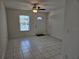 Bright living room featuring tile floors and a view to the front yard at 3333 Se 12Th St, Ocala, FL 34471