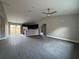 Open living room with high ceilings and hardwood floors at 3941 Se 137Th Ln, Summerfield, FL 34491