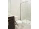 Clean bathroom with shower and dark vanity at 4321 Sw 52Nd Lane Rd, Ocala, FL 34474