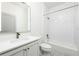 Bathroom featuring a tub with shower and large vanity mirror at 4721 Se 25Th Loop, Ocala, FL 34480