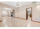 Dining room with chandelier and view into kitchen at 5000 Se 11Th Ave, Ocala, FL 34480