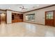 Living room with built-in shelving and large window at 5000 Se 11Th Ave, Ocala, FL 34480