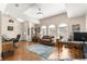 Bright and airy living room with hardwood floors and neutral decor at 5137 Nw 20Th Pl, Ocala, FL 34482