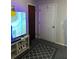 Bedroom featuring a door and a flat screen television, neutral colors, and carpet at 5625 Sw 181St Ct, Dunnellon, FL 34432