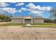 Charming single-story home with neutral siding, manicured lawn, and inviting front entrance at 5885 Sw 169Th Ct, Ocala, FL 34481