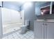 Bathroom with shower/tub combo, toilet, and vanity at 6006 Nw 62Nd Pl, Ocala, FL 34482