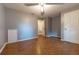 Bedroom with wood-look floors and ceiling fan at 6006 Nw 62Nd Pl, Ocala, FL 34482