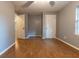 Bedroom with wood-look floors and ceiling fan at 6006 Nw 62Nd Pl, Ocala, FL 34482