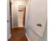 Hallway view of another bathroom and linen closet at 6006 Nw 62Nd Pl, Ocala, FL 34482