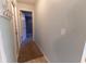 Clean hallway with carpeted floor and access to bedrooms at 6006 Nw 62Nd Pl, Ocala, FL 34482