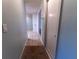 A light and bright hallway with tile flooring at 6006 Nw 62Nd Pl, Ocala, FL 34482