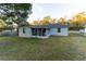 Single story house with screened porch and fenced backyard at 6006 Nw 62Nd Pl, Ocala, FL 34482