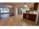 Kitchen with wood cabinets, tiled floor, and stainless steel appliances at 6006 Nw 62Nd Pl, Ocala, FL 34482