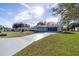 Ranch home with long driveway and beautiful lawn at 6460 Sw 111Th St, Ocala, FL 34476