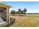 Private backyard with view of golf course and lush landscaping at 6716 Sw 91St Cir, Ocala, FL 34481