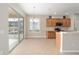 Kitchen with sliding glass doors leading to backyard at 6716 Sw 91St Cir, Ocala, FL 34481