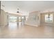 Spacious living room with tile floors and sliding glass doors at 6716 Sw 91St Cir, Ocala, FL 34481