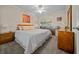 Spacious bedroom with ample light and wood furniture at 749 Midway Dr # A, Ocala, FL 34472