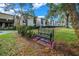 Relaxing bench in a landscaped courtyard, near residential buildings at 749 Midway Dr # A, Ocala, FL 34472