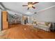 Living room with light laminate floors and neutral color palette at 749 Midway Dr # A, Ocala, FL 34472