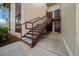 Exterior condo building staircase leading to unit entrance at 749 Midway Dr # A, Ocala, FL 34472