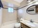 Clean bathroom with a bathtub, toilet and vanity at 7567 Sw 108Th Pl, Ocala, FL 34476