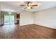 Spacious living room with wood-look floors and ceiling fan at 7567 Sw 108Th Pl, Ocala, FL 34476