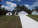 Beautiful home with a well-manicured lawn and extended driveway at 7747 Sw 146Th Lane Rd, Ocala, FL 34473