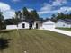 Charming one-story home with a well-maintained lawn and attached garage at 7747 Sw 146Th Lane Rd, Ocala, FL 34473