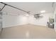 Spacious garage with modern lighting, water heater and ample room for storage at 7747 Sw 146Th Lane Rd, Ocala, FL 34473