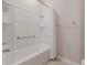 Bathroom with tub shower combo and grab bar at 7838 Sw 85Th Cir, Ocala, FL 34481