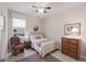 Bedroom with a queen-size bed and dresser at 7838 Sw 85Th Cir, Ocala, FL 34481