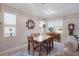 Bright dining area with wooden table and chairs at 7838 Sw 85Th Cir, Ocala, FL 34481