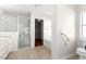 Bathroom with shower, tub, and walk-in closet at 8217 Sw 61St Ct, Ocala, FL 34476