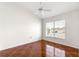 Bedroom with wood-look tile floor and window at 8217 Sw 61St Ct, Ocala, FL 34476