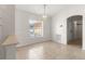 Bright dining area with tile floor and chandelier at 8217 Sw 61St Ct, Ocala, FL 34476