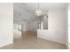 Dining room with tile floors and kitchen access at 8217 Sw 61St Ct, Ocala, FL 34476