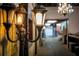 Ornate light fixture adds character to the barn's interior hallway at 8250 Nw 136Th Avenue Rd, Ocala, FL 34482