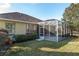 A tranquil enclosed back patio enhances this home's outdoor appeal and charm at 8535 Sw 82Nd Ter, Ocala, FL 34481