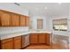 Kitchen featuring a stainless steel dishwasher, hard wood floors, and eat-in dining area at 8535 Sw 82Nd Ter, Ocala, FL 34481