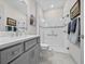 Modern bathroom with gray vanity, white subway tile shower, and a toilet at 8958 Sw 57Th Place Rd, Ocala, FL 34481