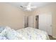 Bedroom with floral bedding and private access to bathroom at 9119 Sw 70Th Loop, Ocala, FL 34481