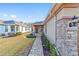 House exterior showcasing walkway, landscaping, and stone accents at 9119 Sw 70Th Loop, Ocala, FL 34481