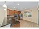 Modern kitchen with stainless steel appliances and granite countertops at 9119 Sw 70Th Loop, Ocala, FL 34481